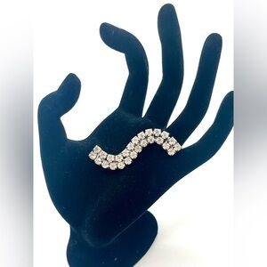 Vintage rhinestone wave brooch silver tone mid century